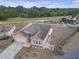 Charming single-story home with a fenced yard, attached garage, and view of surrounding greenery at 4617 Horseshoe Pick Ln, Valrico, FL 33594