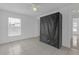 Bedroom with tiled floor, neutral paint, and a window for plenty of natural light at 4617 Horseshoe Pick Ln, Valrico, FL 33594