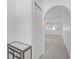 Bright foyer featuring tile flooring, storage closet, and an archway leading to the dining area at 4617 Horseshoe Pick Ln, Valrico, FL 33594