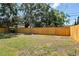 Full view of the wooden privacy fence in the backyard at 4940 Rosedale Ln, Holiday, FL 34690