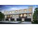 New townhomes feature multi-level balconies and attached garages, blending convenience and modern design at 501 W Ross Ave # 2, Tampa, FL 33602