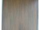 A close-up of the wall with vertical wooden decorative elements at 501 W Ross Ave # 2, Tampa, FL 33602
