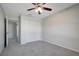 Bedroom with closet and ceiling fan at 6306 Tillandsia Pl, Tampa, FL 33610