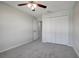 Carpeted bedroom with closet at 6306 Tillandsia Pl, Tampa, FL 33610