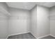Walk-in closet with wire shelving and carpet at 6306 Tillandsia Pl, Tampa, FL 33610