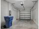 A clean, two-car garage provides ample space for parking and storage at 6306 Tillandsia Pl, Tampa, FL 33610