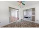 Enclosed sunroom with sliding glass doors with views into the bedroom and living room at 6514 Thicket Trl, New Port Richey, FL 34653