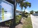 Community information sign with landscaping in a well-maintained neighborhood at 6534 Fairway Gardens Dr # 17-201, Bradenton, FL 34203