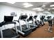 Fitness center with treadmills, weight machines, and mirrored walls at 6534 Fairway Gardens Dr # 17-201, Bradenton, FL 34203