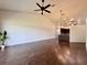 Open concept living room featuring high ceilings and wood flooring and plenty of light at 6534 Fairway Gardens Dr # 17-201, Bradenton, FL 34203