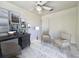 Bright home office setup with a desk and comfortable seating area at 6534 Fairway Gardens Dr # 17-201, Bradenton, FL 34203