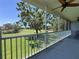 Enjoy beautiful golf course views from this screened patio with a ceiling fan and green scenery at 6534 Fairway Gardens Dr # 17-201, Bradenton, FL 34203