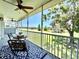 Relax on this screened patio overlooking a lush golf course, complete with a ceiling fan at 6534 Fairway Gardens Dr # 17-201, Bradenton, FL 34203
