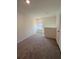 Upstairs bedroom with neutral carpet at 7530 Broad Pointe Dr, Zephyrhills, FL 33540
