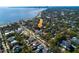 Scenic aerial view of the neighborhood near the coast with lush greenery and city views at 827 S Delaware Ave, Tampa, FL 33606