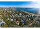 Expansive aerial view of a neighborhood with waterfront access and skyline views at 827 S Delaware Ave, Tampa, FL 33606