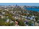 Scenic aerial view of neighborhood with city skyline in the background at 827 S Delaware Ave, Tampa, FL 33606