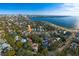 Aerial view with directional arrow of a neighborhood with waterfront access and skyline views at 827 S Delaware Ave, Tampa, FL 33606