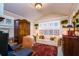 Bright office space with vaulted ceilings, custom wood built-ins, and neutral paint at 827 S Delaware Ave, Tampa, FL 33606