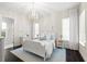Serene bedroom with white furnishings, soft lighting, and tasteful decor for ultimate relaxation at 885 Seaview Cir # 20, Crystal Beach, FL 34681