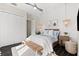 Comfortable bedroom features hardwood floors, a ceiling fan, and built-in storage at 885 Seaview Cir # 20, Crystal Beach, FL 34681