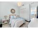 Cozy bedroom with a beachy vibe features neutral decor and a ceiling fan at 885 Seaview Cir # 20, Crystal Beach, FL 34681