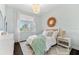 Comfortable bedroom with natural light, a woven headboard, and light blue accents at 885 Seaview Cir # 20, Crystal Beach, FL 34681