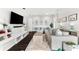 Cozy living room includes comfortable seating, built-in storage, and a TV; great for relaxing at 885 Seaview Cir # 20, Crystal Beach, FL 34681