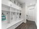Well-organized mudroom with custom built-in storage and convenient seating at 885 Seaview Cir # 20, Crystal Beach, FL 34681