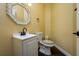 Bathroom with vanity and toilet at 9315 Knightsbridge Ct, Tampa, FL 33647