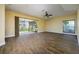 Spacious living room with sliding glass doors leading to the backyard at 9315 Knightsbridge Ct, Tampa, FL 33647