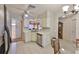 Corner of kitchen, featuring stainless steel appliances, sink and view of the entryway at 1005 Hardwood Dr, Valrico, FL 33596