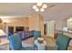 Open-concept living room featuring a dining area and stylish furnishings at 1005 Hardwood Dr, Valrico, FL 33596