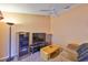 Cozy living space with entertainment center, natural light, and comfortable seating at 1005 Hardwood Dr, Valrico, FL 33596