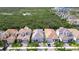 Aerial view of beautiful homes showcases meticulously landscaped lawns and well-maintained exteriors within the community at 1015 Seagrape Dr, Ruskin, FL 33570