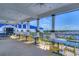 Outdoor balcony with beautiful views of the marina, perfect for relaxing and entertaining guests at 1015 Seagrape Dr, Ruskin, FL 33570