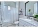 White bathroom with a tub and shower combination with granite countertops at 1015 Seagrape Dr, Ruskin, FL 33570