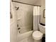 Bathroom with shower and striped curtain at 1020 85Th N Ave # 222, St Petersburg, FL 33702