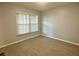 Bedroom with window with blinds and neutral walls at 1020 85Th N Ave # 222, St Petersburg, FL 33702