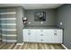 Modern kitchen with white cabinets, granite counters, and stainless-steel appliances at 1020 85Th N Ave # 222, St Petersburg, FL 33702