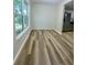 Cozy room with a kitchen and stainless steel refrigerator at 1020 85Th N Ave # 222, St Petersburg, FL 33702