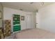 Bedroom featuring a closet, carpeted floor, and a dresser with boxes next to it at 10516 Mira Vista Dr, Port Richey, FL 34668