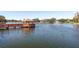 Beautiful lake with pier and gazebo in a peaceful community setting at 10516 Mira Vista Dr, Port Richey, FL 34668