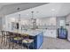 Modern kitchen with a large island, stainless steel appliances, and ample counter space at 10825 Christopher Ct, Largo, FL 33774