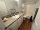 Cozy bathroom with white vanity and shower with curtain at 11312 Brussels Boy Ln, Riverview, FL 33578