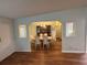 Charming dining room featuring an archway and hardwood floors at 11312 Brussels Boy Ln, Riverview, FL 33578