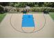 Aerial shot of the community basketball court with lush green surroundings and well-maintained landscaping at 11688 Brighton Knoll Loop, Riverview, FL 33579