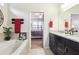 Inviting bathroom with a soaking tub and seamless bedroom access, creating a private spa oasis at 11688 Brighton Knoll Loop, Riverview, FL 33579