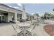 Outdoor patio area featuring multiple seating options and tables for community gatherings at 11688 Brighton Knoll Loop, Riverview, FL 33579