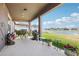 Outdoor patio area with ample seating and a grill, ideal for entertaining and enjoying the outdoor view at 11688 Brighton Knoll Loop, Riverview, FL 33579